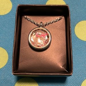 Avon breast cancer crusade charm necklace.